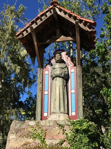 A statue of Fr. Junipero Serra greets you on your way to Carmel proper.